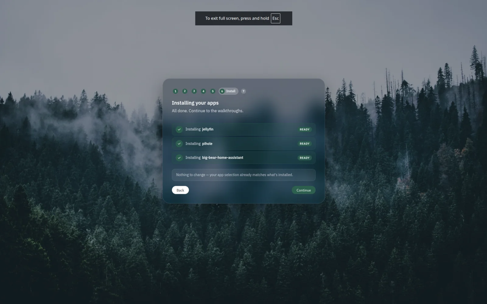 Welcome wizard step showing 'Installing your apps' with progress for jellyfin, pihole, and home-assistant.